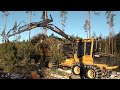 Tigercat 1055B forwarder equipped with Breson brush compactor extracting biomass from a recently harvested cut block in Sweden. The unit is owned by Stig Löf. Look for the full story in Between the Branches, July 2011.