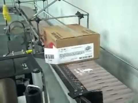 Leading Panel Tamp with Passive Corner Wrap (Print Apply)
