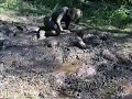 Mudwrestling with 3rd EX wife in wetsuits Mudwrestling with 3rd EX wife in wetsuits
