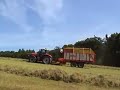 Pottinger Torro going up hill with MF 6499 pulling