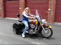 DaBikerLady goofing off on her 02 Honda Shadow