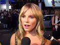 sienna miller has won damages from the sun and news of the world after they published nude photographs of her while filming a movie.