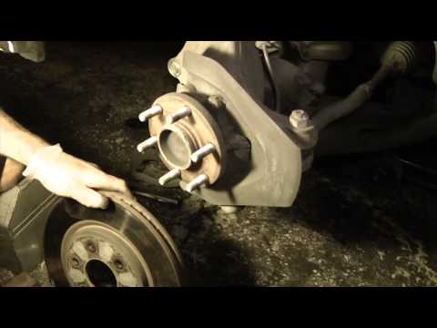 2006 Nissan Frontier Truck front brake pad & rotor DIY replacement