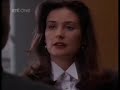 demi moore wears a business suit and high heels, nice bare legs.
