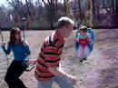 Ana swings with Papaw, Leah, and Jeremy