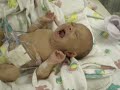 Mom and Dad finally get a chance to bathe their little girl!