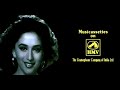 Singers: SP Balasubramaniam, Lata Mangeshkar Movie: Hum Aapke Hain Kaun (1994) Starring: Salman Khan, Madhuri Dixit ___________________ LYRICS (+ Translation) ___________________ ham aapke hain kaun... Who am I to you?... bechain hai meri nazar My gaze is restless hai pyaar ka kaisa asar What an effect love has on me! na chup raho itna kaho Don't stay quiet; tell me at least this much: ham aapke...aapke hain kaun Who am I... who am I to you khud ko sanam roka bada So many times I stopped myself, beloved aakhir mujhe kahana pada but at last, I had to speak khwaabo.n mein tum aate ho kyon Why do you enter my dreams? ham aapke...aapke hain kaun Who am I... who am I to you bechain hai meri nazar My gaze is restless hai pyaar ka kaisa asar What an effect love has on me! hai hosh gam puuchho na tum It is a constant worry; don't ask me ham aapke...aapke hain kaun who I am... who I am to you kaise kahuun dil ki lagi How shall I tell you of my heart's desire? chehara mera padh lo kabhi Read my face sometime yeh sharm ki surkhi kahe The blush on my face may tell you ham aapke...aapke hain kaun... who I am...who I am to you