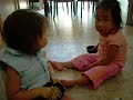 Maile and Gigi eatting cheerios