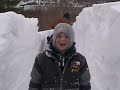 Had a blizzard last night and filled in my 600' driveway.  I had snowdrifts from 2' to 5'.  Took me 9 hours to snowblow it. I'm 6'2 so you can see how high the drift is.