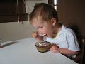 23 month old making his own snack, montessori