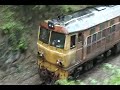 frieght no. 673 (oil) Banpeokpaek - Lampang service by ALATHOM 4123 pass the curve near Phakhan Train Station on northern railway of Thailand.