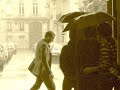 rendez-vous sous la pluie par jean sablon, 1936.
musique de johnny hess et paroles de charles trenet. et �a se pourrait bien que ce soit django reinhardt � la guitare. �a m'en a tout l'air...