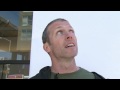 Photographer Clay Enos goes from shooting super heroes on the set of Watchmen to taking street portraits of random people. He shows us how to do a street-studio portrait session with a sheet of white paper, some tape, and a camera.