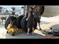 how to change a main tire on an airbus: wait for the ramp temperature to be in the high 90's (37c)and have a load of impatient passengers. then find 3 or 4 of your best friends, an 85 ton jack and a 10 foot long 