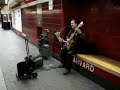 In My Life performer in the T at Harvard Square