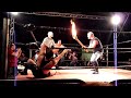 Keith destorying Matt Slator with a flaming 2x4