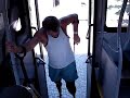 Tulio is going up to bus to Rio - Brazil ( B )
