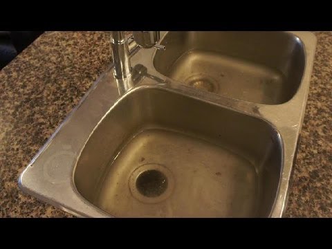 how to unclog a sink that is full of water