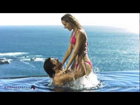 Young Couple Swimming in Super Slow Motion