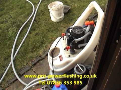 how to drain sludge from radiator