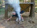 bushcraft survival tarp shelter with fire