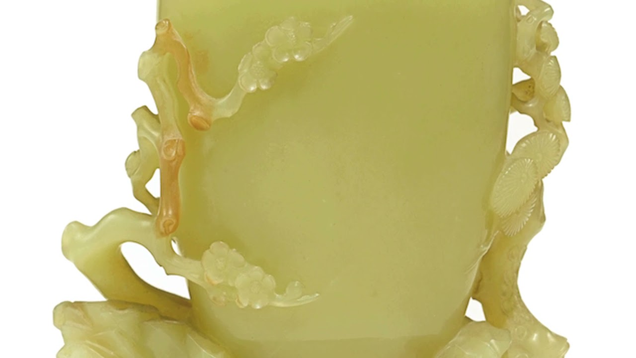 Carved yellow jade vase and cover