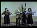 the tall timber band - vivian williams, fiddle; phil williams, mandolin; sue thompson, guitar; barney munger, bass, performing a medley of fiddle tunes - ferry bridge hornpipe, danny flannigan's clog, and rickett's hornpipe, at the seattle concert theater, 1981, recorded on betamax.  you can hear more music from these musicians on cds from voyager recordings, www.voyagerrecords.com