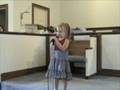 Zoe singing Jesus Loves the Little Children