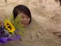 Bdae girl buried in sand (1) Bdae girl buried in sand (1)