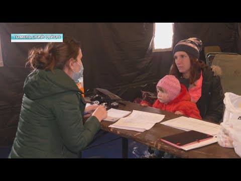 Помощь мигрантам видео
