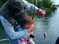Julia catches arctic grayling near Fairbanks, AK
