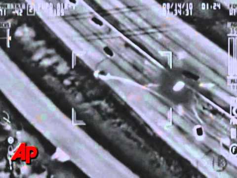Raw Video: Suspect Drives Head-On Into Cop Car
