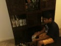 Misael Playing His Wii Game