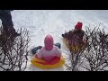 Annalise and Isabella Sled Down the Hill