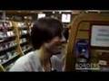 Wes Anderson and Jason Schwartzman Shop for CDs and DVDs