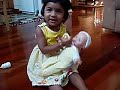 shreya plays with her baby doll