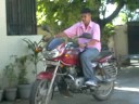 Suraj Riding a Motorcycyle