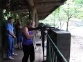 Me firing an AK 47 at Cu Chi tunnels