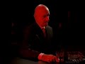 live aid commercial from jonathan glazer with ben kingsley in a bar.