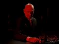 live aid commercial from jonathan glazer with ben kingsley in a bar.
