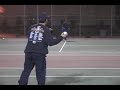 Brody Stevens pitching on a tennis court