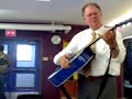 Mr. Conrod playing my guitar