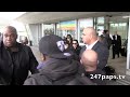 a pregnant kim kardashian and kourtney kardashian with her baby penelope walking through jfk airport today. kourtney stopped at a store to put the baby in th...