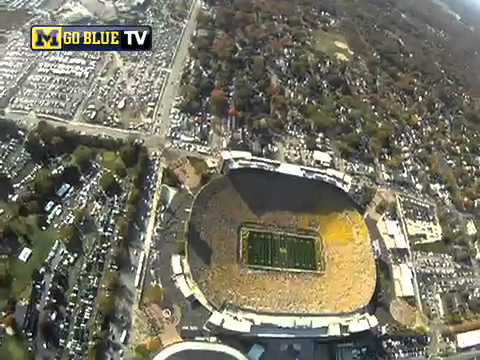 airborne - Sgt. Adam Sniffen from the 101st Airborne Division delivers the game ball via parachute before the Michigan vs. MSU game at Michigan Stadium on Oct. 9, 2010.
