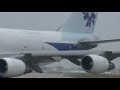 Boeing 747-200F wet runway take off close up - Manchester UK