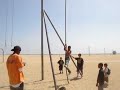 Me climing the rope at santa Monica