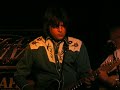 Travis Mann guitars and cadillacs