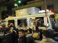 Watch the crowd explode in the streets of the Bronx as the ambulance and fire truck come by.... all it takes is one dude to set it off... World Series won in the Bx again....priceless. Walk with me thru these streets i call home... ... Yankees World Series Bronx Zoo Gate outside november 4th Phillies DJNESSNYC Live Footage NYC Party 