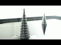 Morpho Towers -- Two Standing SpiralsFerrofluid Electromagnetic SculpturesArtists Sachiko Kodama and Yasushi Miyajima create magnificently surreal kinetic sculptures where a liquid filled with nanoscale ferromagnetic particles flows, rotates, and shapeshifts around a simple iron tower structure in response to shifts in a magnetic field. The piece is titled 