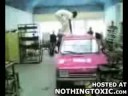 Idiot does a backflip in his garage